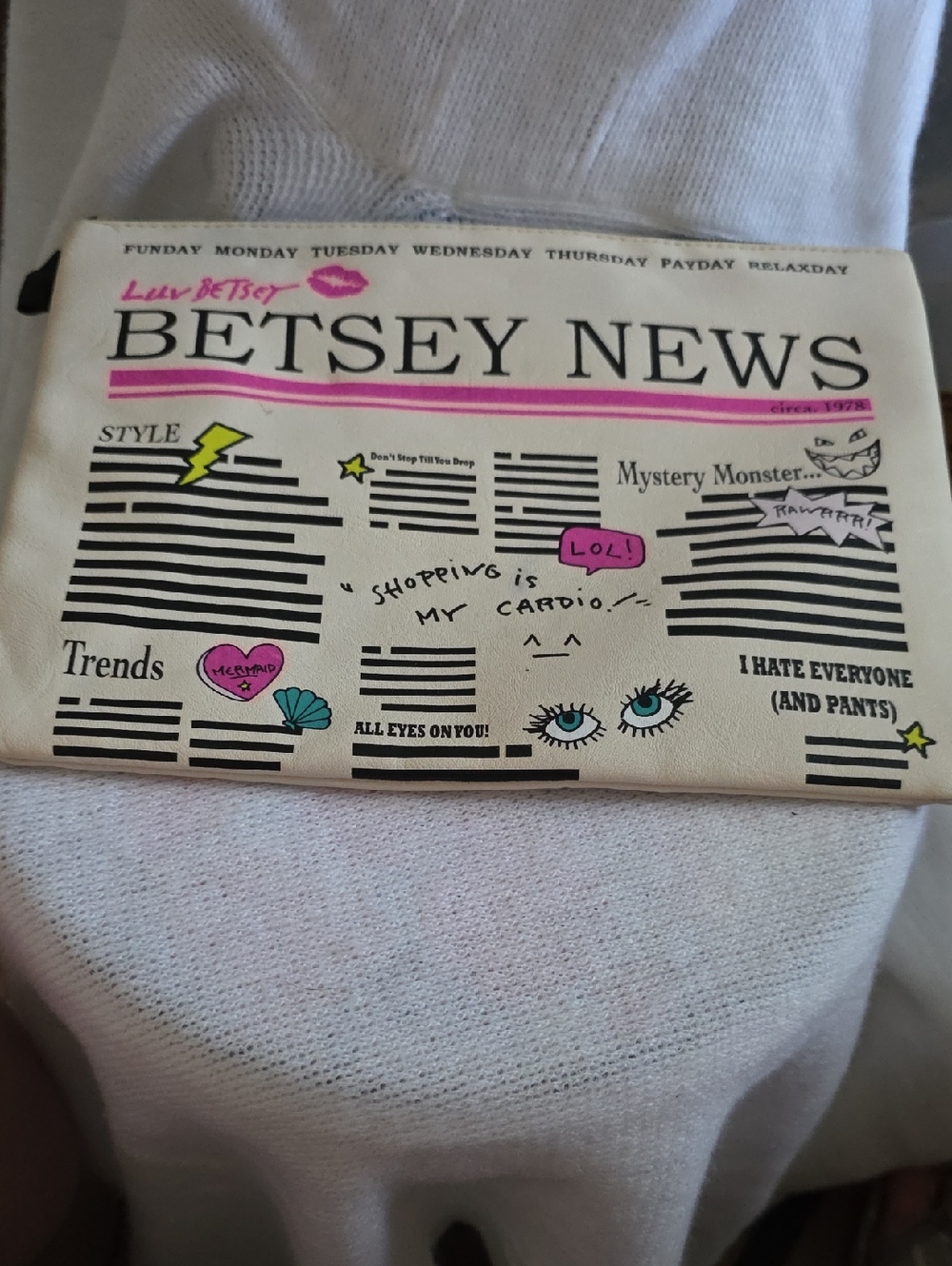 Betsey Johnson Cream Newsprint Cosmetic Pouch with Pink Accents